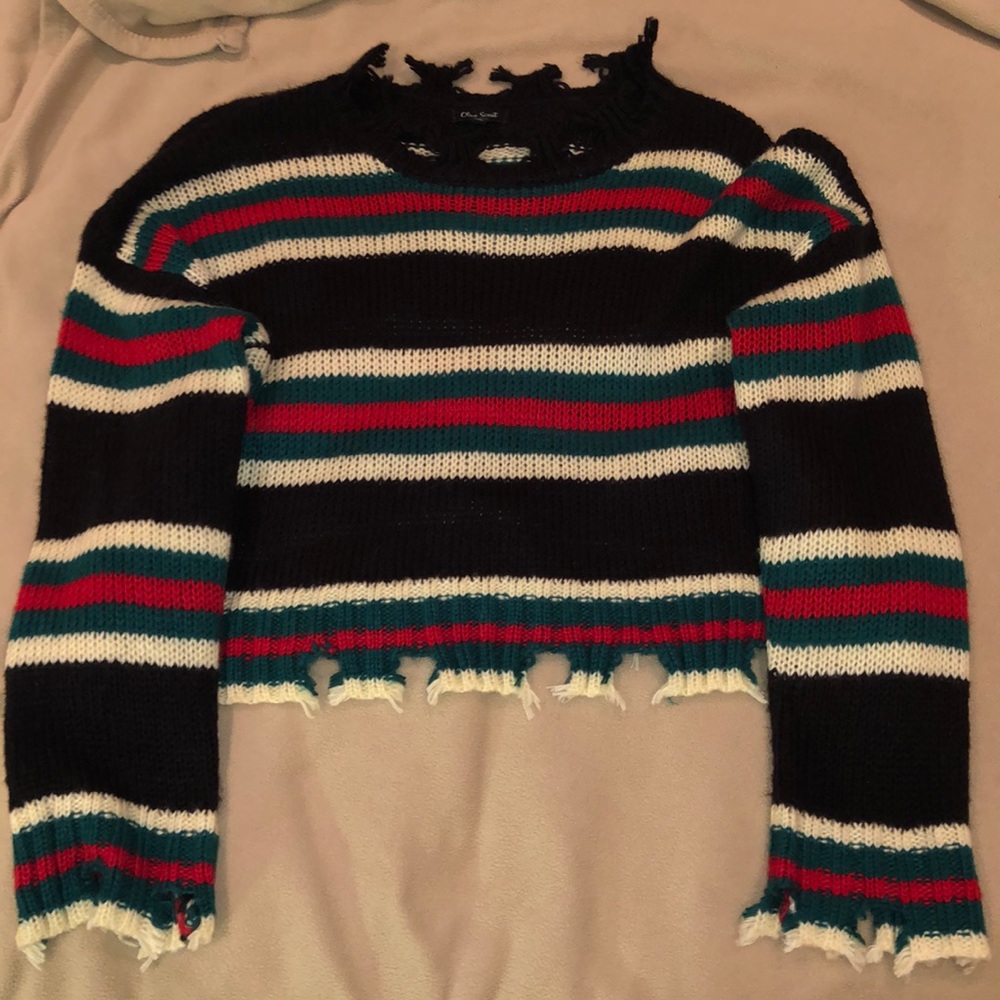 Frayed trendy sweater